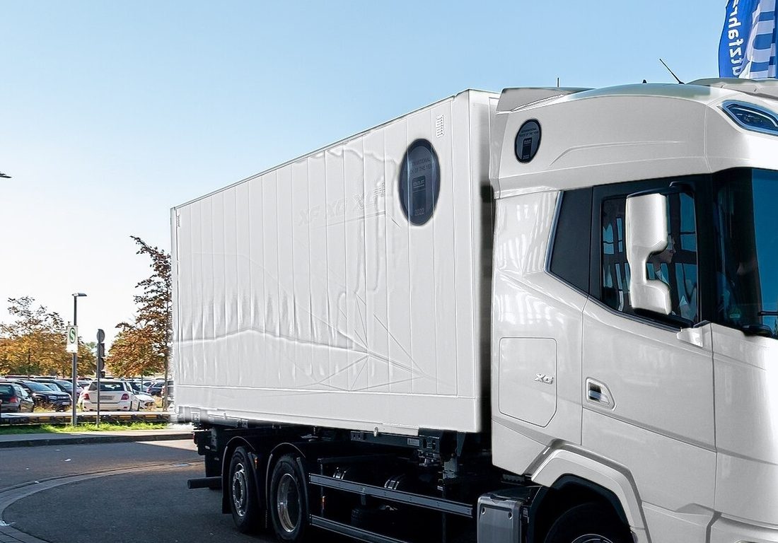 White DAF XG box truck with twin rear axles for temperature-controlled transport
